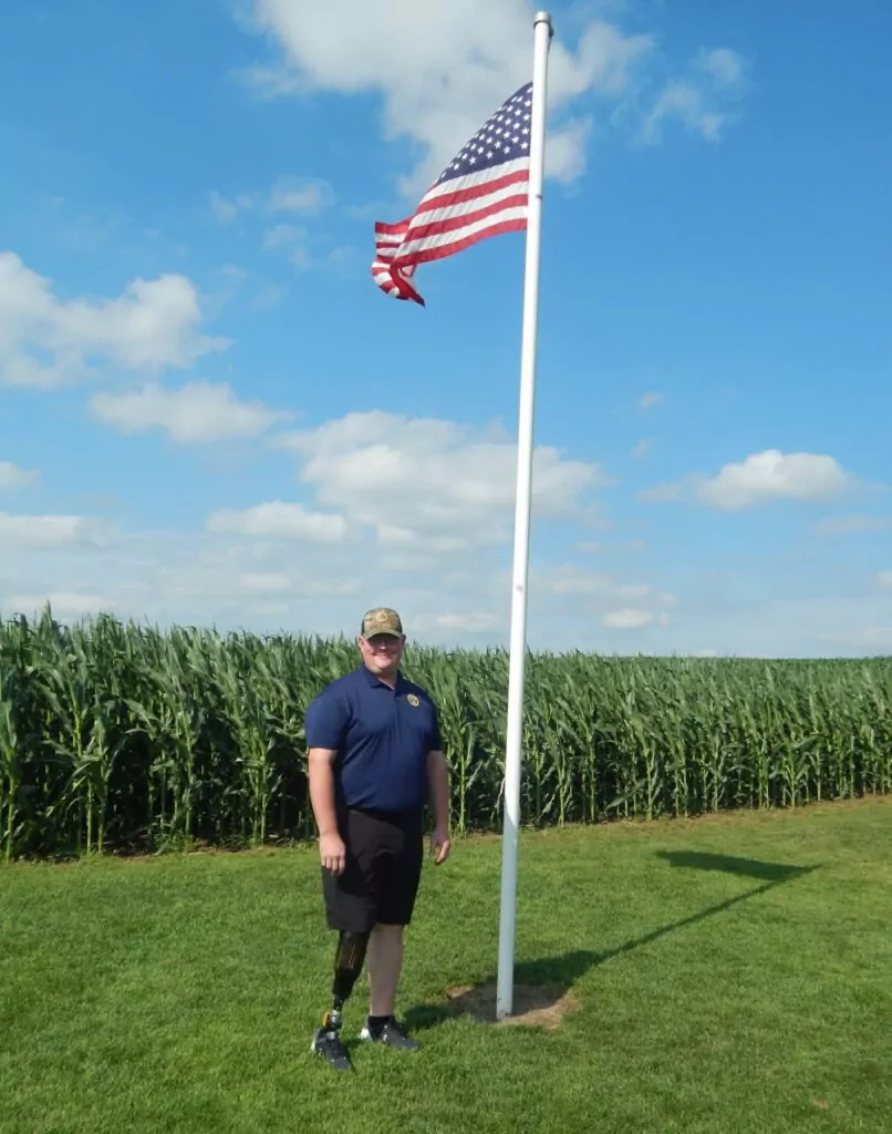 brian veteran at flagpole
