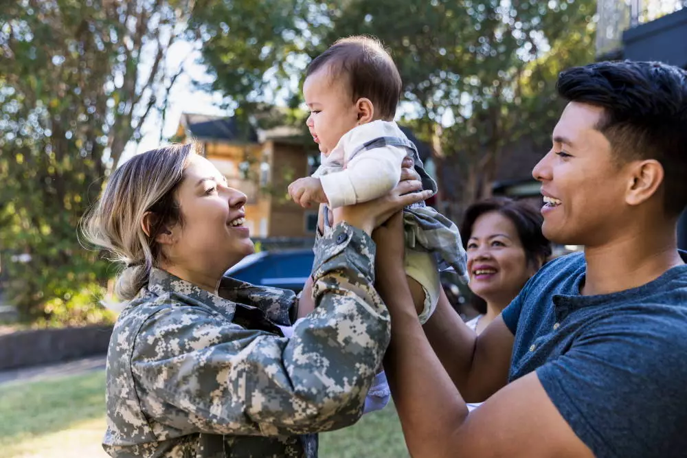 female veteran returning home to baby and family